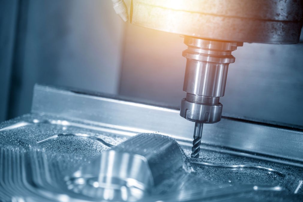 CNC milling machine in use, close-up.